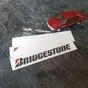 наклейка Bridgestone длиной 15 см