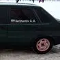 На фото наклейка высотой 6 см