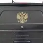 На фото герб из золотисто-медной пленки размером 27 х 30 см